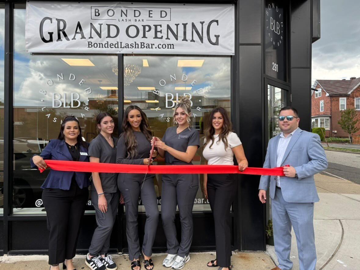 Jacqueline Zsoldos at a client grand opening ribbon-cutting event in Nutley, New Jersey